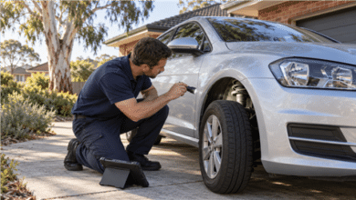 Independent inspector from Instant Auto Reach checking a used car's engine bay
